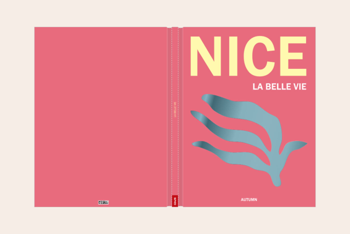 Album photo voyage Nice avec couverture rose corail, texte jaune et feuille tropicale bleue